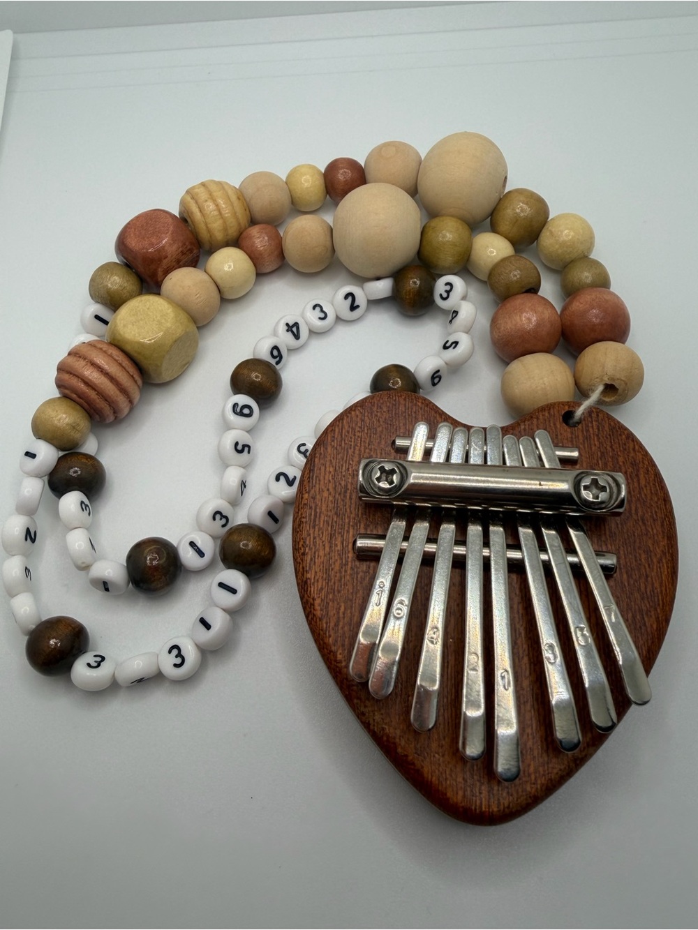 Handcrafted Wooden Heart Kalimba Necklace - Neutral Tones